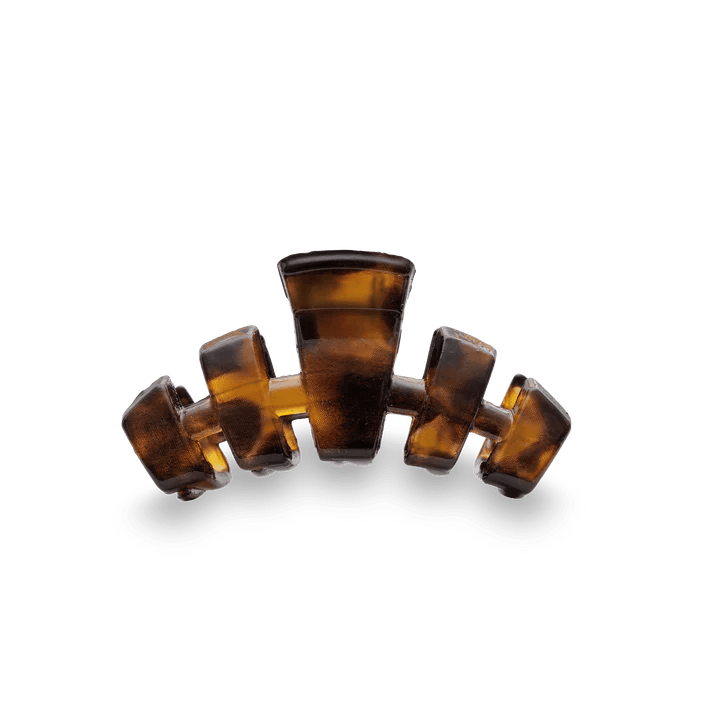 Brown hair clip on a white background