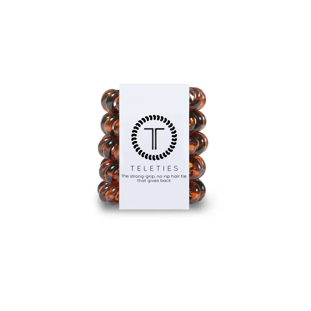 A package of TELETIES tiny brown hair ties designed for kids and fine hair.