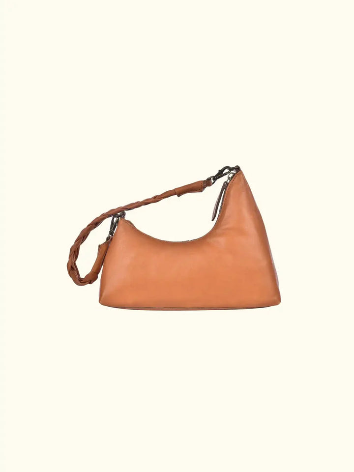 Velutto Washed Leather Shoulder Bag in Caramel — rear three-quarter view of sculpted bag shape