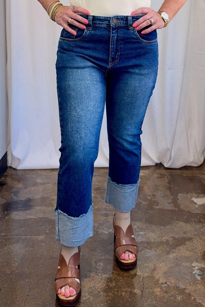 Wide Cuff Straight Leg Crop Jean in Blue by Carole Christian — left side view showing high rise waistband and stitched wide cuff detail